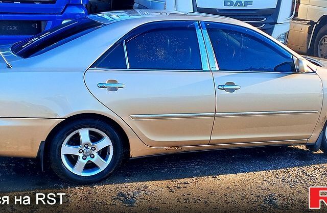 Бежевый Тойота Камри, объемом двигателя 2.4 л и пробегом 266 тыс. км за 5500 $, фото 2 на Automoto.ua