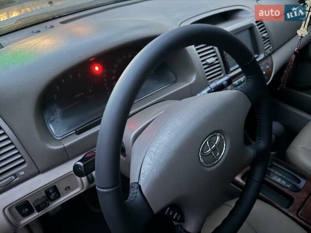 Бежевый Тойота Камри, объемом двигателя 3 л и пробегом 384 тыс. км за 4700 $, фото 18 на Automoto.ua