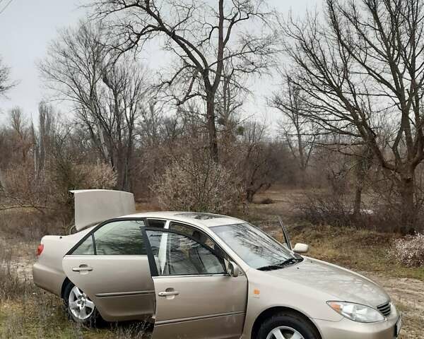 Бежевий Тойота Камрі, об'ємом двигуна 2.4 л та пробігом 299 тис. км за 6400 $, фото 24 на Automoto.ua