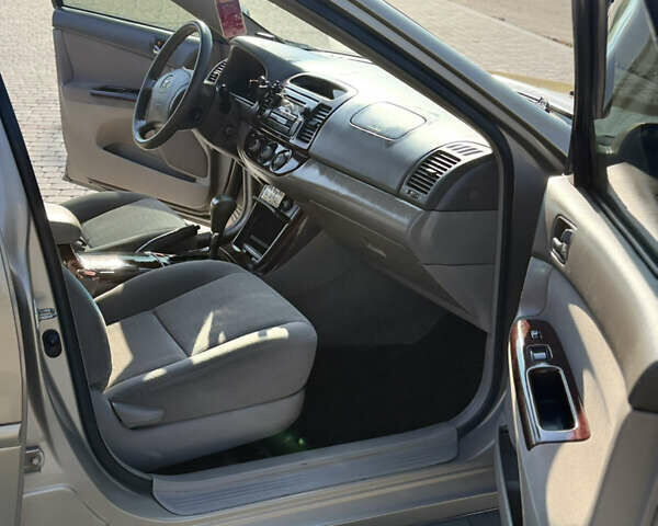 Бежевий Тойота Камрі, об'ємом двигуна 2.36 л та пробігом 122 тис. км за 5750 $, фото 14 на Automoto.ua