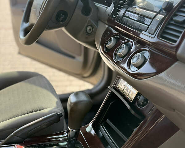 Бежевий Тойота Камрі, об'ємом двигуна 2.36 л та пробігом 122 тис. км за 5750 $, фото 16 на Automoto.ua