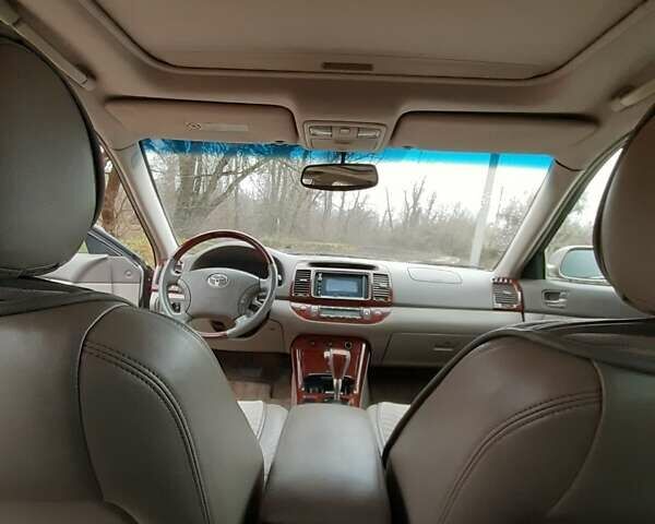 Бежевий Тойота Камрі, об'ємом двигуна 2.4 л та пробігом 299 тис. км за 6400 $, фото 43 на Automoto.ua