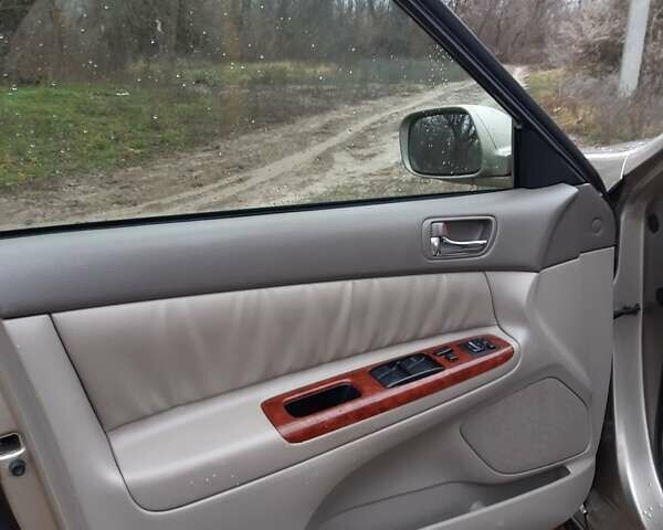 Бежевий Тойота Камрі, об'ємом двигуна 2.4 л та пробігом 299 тис. км за 6400 $, фото 46 на Automoto.ua