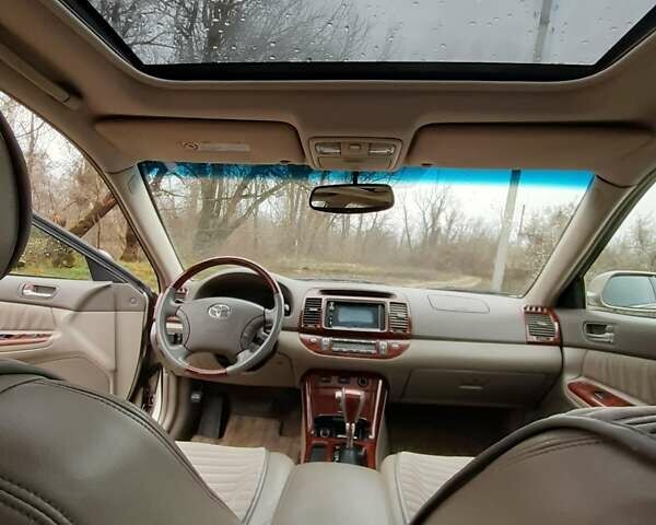 Бежевий Тойота Камрі, об'ємом двигуна 2.4 л та пробігом 299 тис. км за 6400 $, фото 42 на Automoto.ua