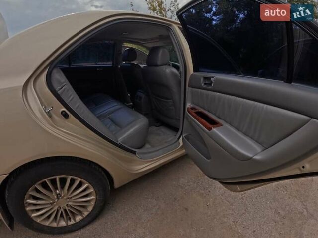 Бежевый Тойота Камри, объемом двигателя 3 л и пробегом 220 тыс. км за 5300 $, фото 9 на Automoto.ua