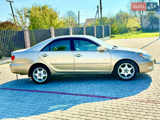 Бежевий Тойота Камрі, об'ємом двигуна 2.36 л та пробігом 122 тис. км за 5750 $, фото 6 на Automoto.ua