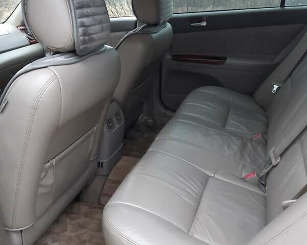 Бежевий Тойота Камрі, об'ємом двигуна 2.4 л та пробігом 299 тис. км за 6400 $, фото 47 на Automoto.ua