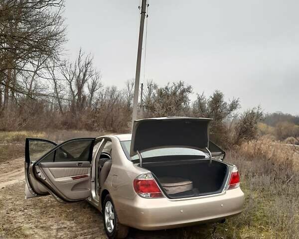 Бежевий Тойота Камрі, об'ємом двигуна 2.4 л та пробігом 299 тис. км за 6400 $, фото 28 на Automoto.ua