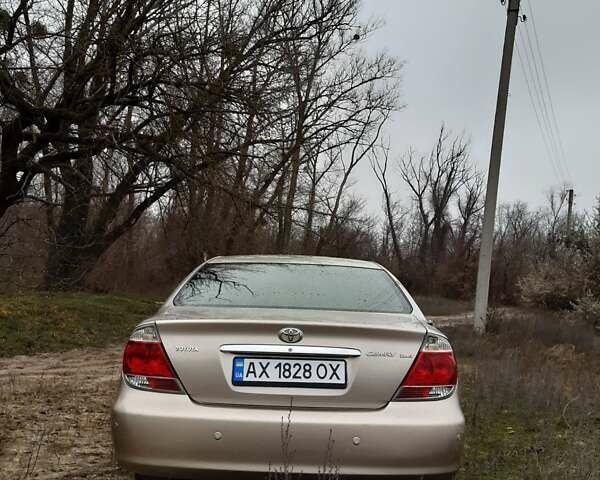 Бежевий Тойота Камрі, об'ємом двигуна 2.4 л та пробігом 299 тис. км за 6400 $, фото 16 на Automoto.ua