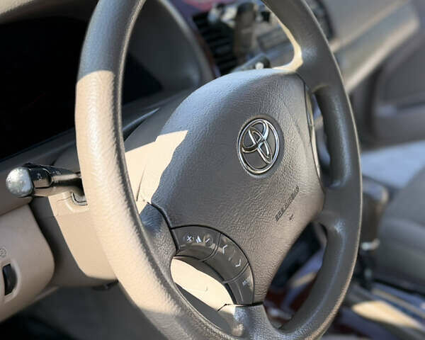 Бежевий Тойота Камрі, об'ємом двигуна 2.36 л та пробігом 122 тис. км за 5750 $, фото 12 на Automoto.ua