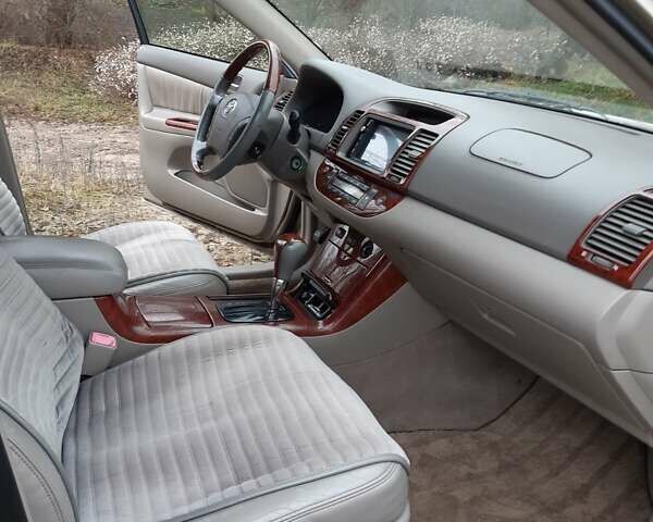 Бежевий Тойота Камрі, об'ємом двигуна 2.4 л та пробігом 299 тис. км за 6400 $, фото 51 на Automoto.ua
