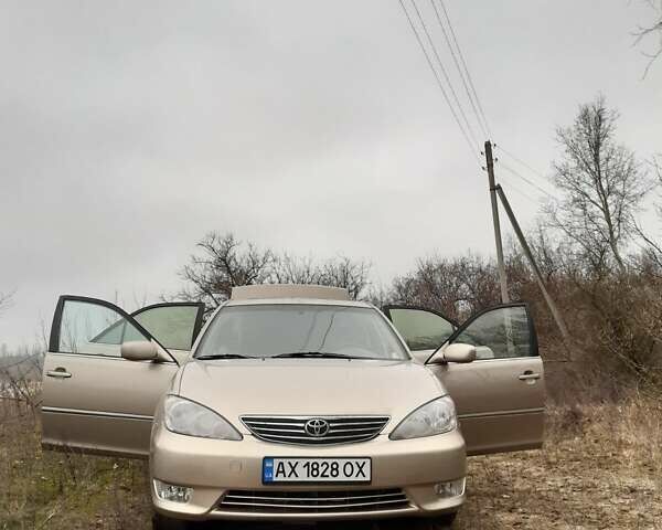 Бежевий Тойота Камрі, об'ємом двигуна 2.4 л та пробігом 299 тис. км за 6400 $, фото 35 на Automoto.ua