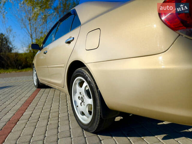 Бежевий Тойота Камрі, об'ємом двигуна 2.36 л та пробігом 122 тис. км за 5750 $, фото 25 на Automoto.ua