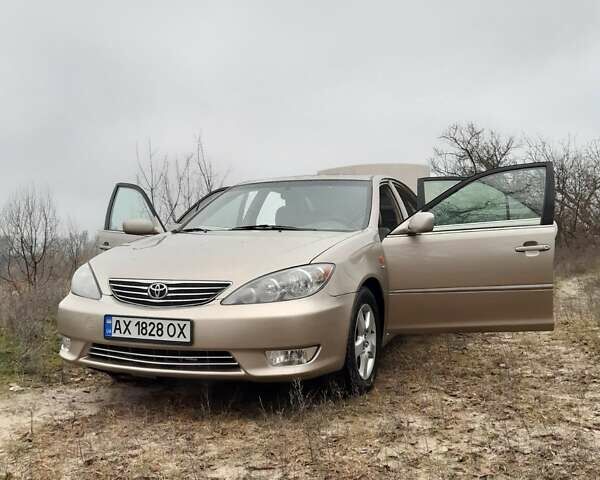 Бежевий Тойота Камрі, об'ємом двигуна 2.4 л та пробігом 299 тис. км за 6400 $, фото 34 на Automoto.ua