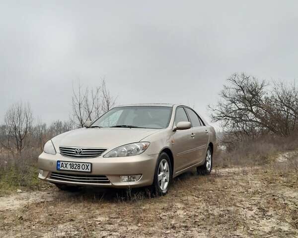 Бежевий Тойота Камрі, об'ємом двигуна 2.4 л та пробігом 299 тис. км за 6400 $, фото 19 на Automoto.ua