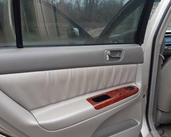 Бежевий Тойота Камрі, об'ємом двигуна 2.4 л та пробігом 299 тис. км за 6400 $, фото 48 на Automoto.ua