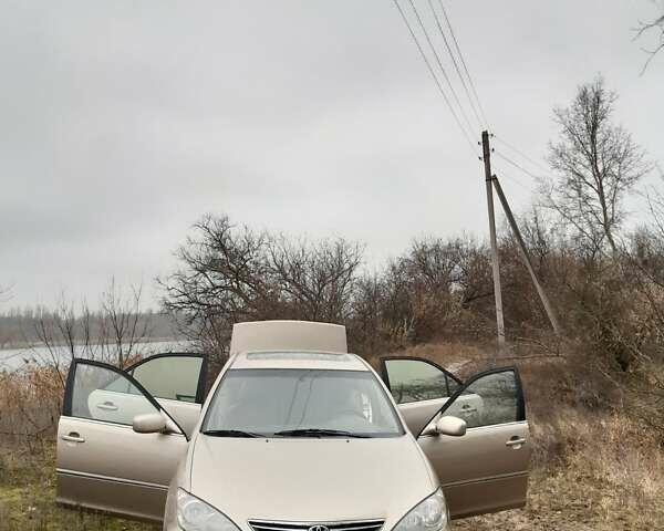 Бежевий Тойота Камрі, об'ємом двигуна 2.4 л та пробігом 299 тис. км за 6400 $, фото 36 на Automoto.ua