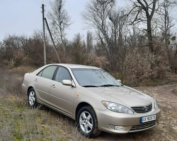 Бежевий Тойота Камрі, об'ємом двигуна 2.4 л та пробігом 299 тис. км за 6400 $, фото 11 на Automoto.ua