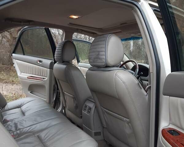 Бежевий Тойота Камрі, об'ємом двигуна 2.4 л та пробігом 299 тис. км за 6400 $, фото 49 на Automoto.ua