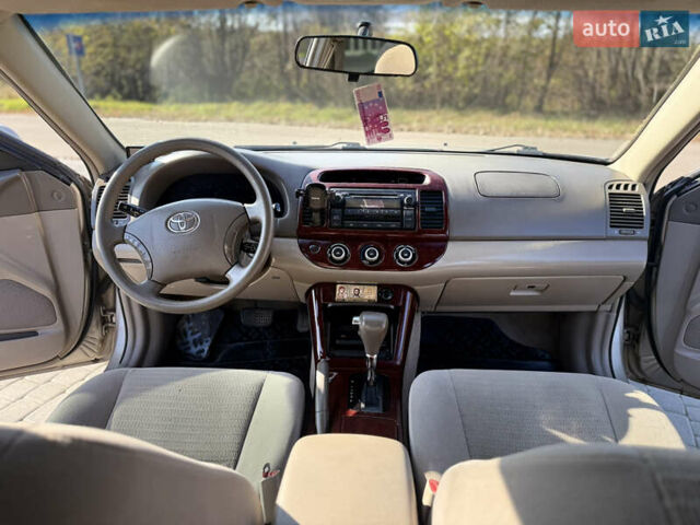 Бежевий Тойота Камрі, об'ємом двигуна 2.36 л та пробігом 122 тис. км за 5750 $, фото 17 на Automoto.ua