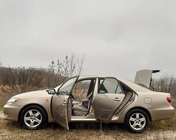 Бежевий Тойота Камрі, об'ємом двигуна 2.4 л та пробігом 299 тис. км за 6400 $, фото 31 на Automoto.ua