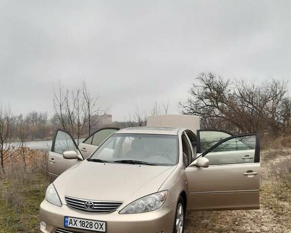 Бежевий Тойота Камрі, об'ємом двигуна 2.4 л та пробігом 299 тис. км за 6400 $, фото 33 на Automoto.ua