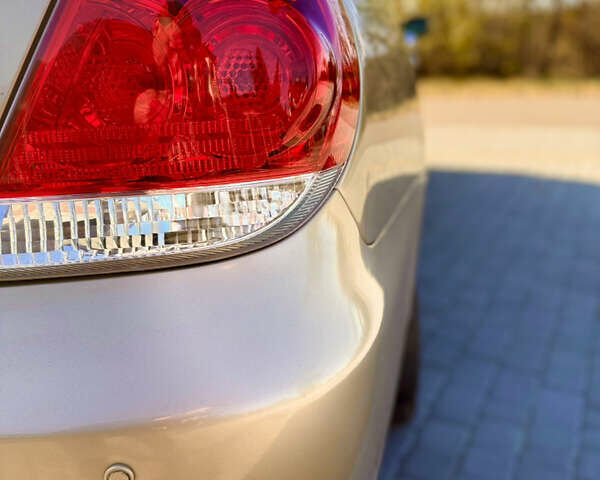 Бежевий Тойота Камрі, об'ємом двигуна 2.36 л та пробігом 122 тис. км за 5750 $, фото 26 на Automoto.ua