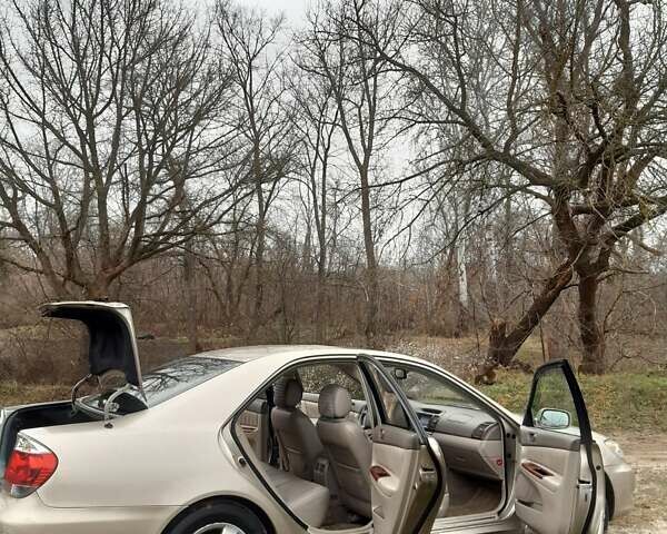 Бежевий Тойота Камрі, об'ємом двигуна 2.4 л та пробігом 299 тис. км за 6400 $, фото 25 на Automoto.ua