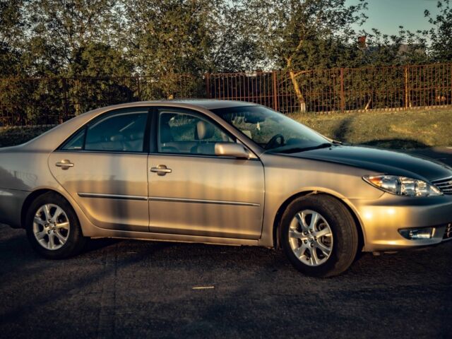 Бежевий Тойота Камрі, об'ємом двигуна 3 л та пробігом 212 тис. км за 5900 $, фото 2 на Automoto.ua