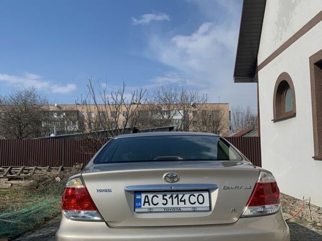 Бежевий Тойота Камрі, об'ємом двигуна 3 л та пробігом 212 тис. км за 5900 $, фото 15 на Automoto.ua