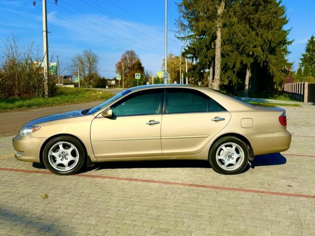 Бежевий Тойота Камрі, об'ємом двигуна 2.4 л та пробігом 122 тис. км за 5999 $, фото 6 на Automoto.ua