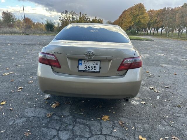 Бежевий Тойота Камрі, об'ємом двигуна 2.4 л та пробігом 147 тис. км за 8800 $, фото 2 на Automoto.ua