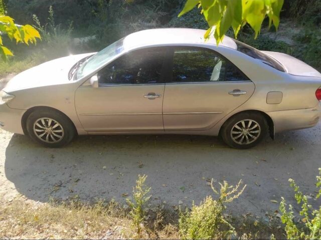 Бежевий Тойота Камрі, об'ємом двигуна 2.4 л та пробігом 270 тис. км за 3643 $, фото 4 на Automoto.ua