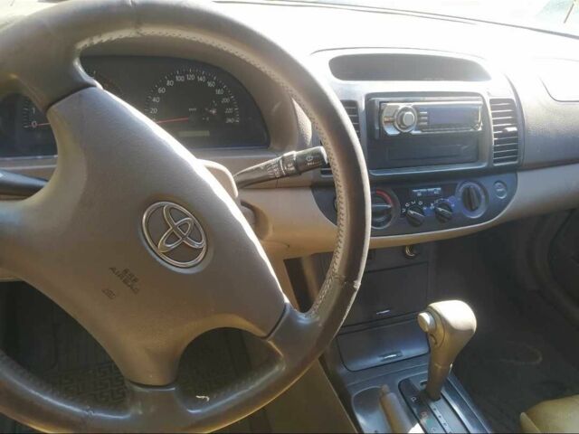 Бежевий Тойота Камрі, об'ємом двигуна 2.4 л та пробігом 270 тис. км за 3643 $, фото 7 на Automoto.ua