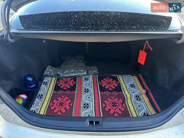 Бежевий Тойота Камрі, об'ємом двигуна 2.36 л та пробігом 144 тис. км за 8800 $, фото 9 на Automoto.ua