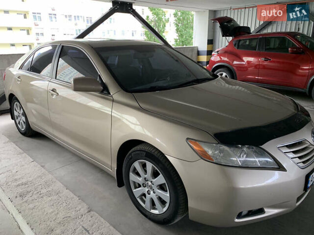 Бежевый Тойота Камри, объемом двигателя 3.5 л и пробегом 245 тыс. км за 10300 $, фото 1 на Automoto.ua