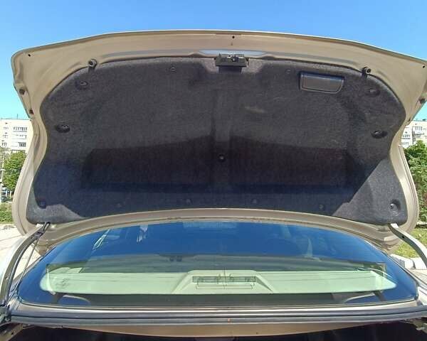 Бежевий Тойота Камрі, об'ємом двигуна 3.46 л та пробігом 153 тис. км за 12700 $, фото 32 на Automoto.ua