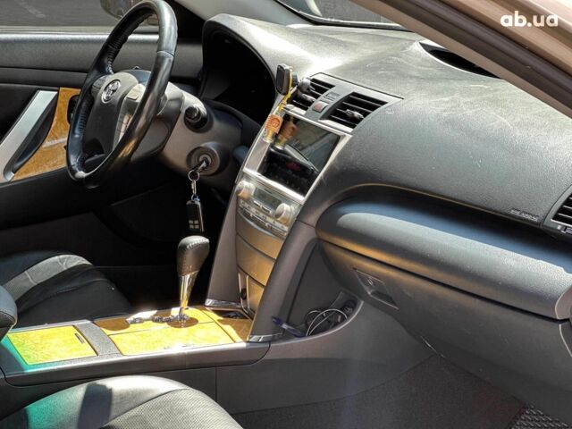 Бежевий Тойота Камрі, об'ємом двигуна 2.4 л та пробігом 325 тис. км за 9890 $, фото 18 на Automoto.ua