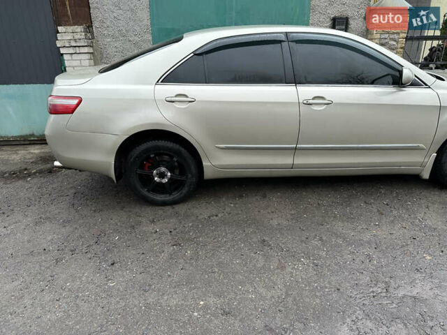 Бежевий Тойота Камрі, об'ємом двигуна 2.4 л та пробігом 230 тис. км за 7700 $, фото 7 на Automoto.ua