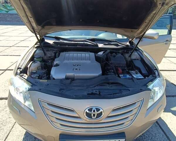 Бежевий Тойота Камрі, об'ємом двигуна 3.46 л та пробігом 153 тис. км за 12700 $, фото 29 на Automoto.ua