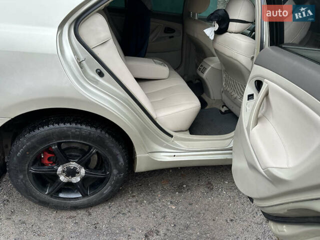 Бежевий Тойота Камрі, об'ємом двигуна 2.4 л та пробігом 230 тис. км за 7700 $, фото 3 на Automoto.ua