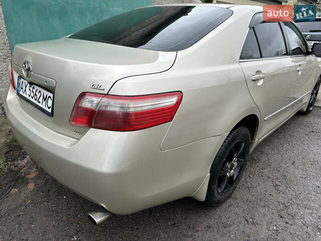 Бежевий Тойота Камрі, об'ємом двигуна 2.4 л та пробігом 230 тис. км за 7700 $, фото 1 на Automoto.ua