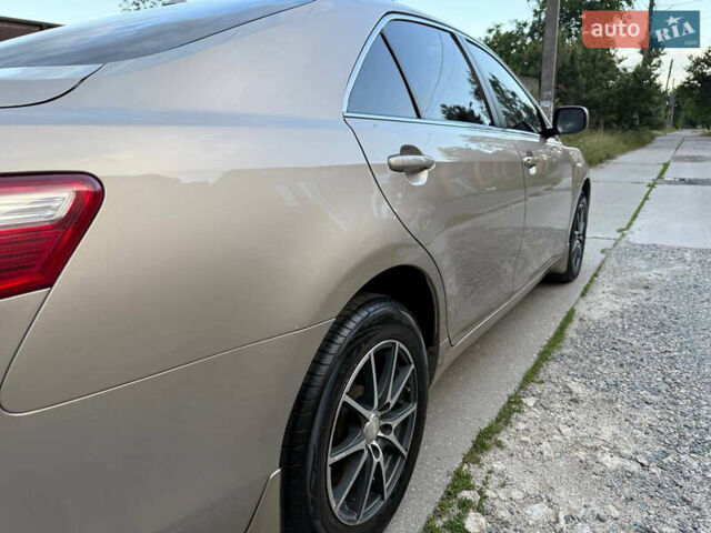 Тойота Камри 2008 в Харькове на Automoto.ua Бежевый Тойота Камри, объемом двигателя 2.4 л и пробегом 73 тыс. км за 10000 $, фото 69 на Automoto.ua