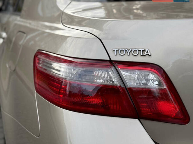 Бежевый Тойота Камри, объемом двигателя 3.5 л и пробегом 156 тыс. км за 9500 $, фото 18 на Automoto.ua