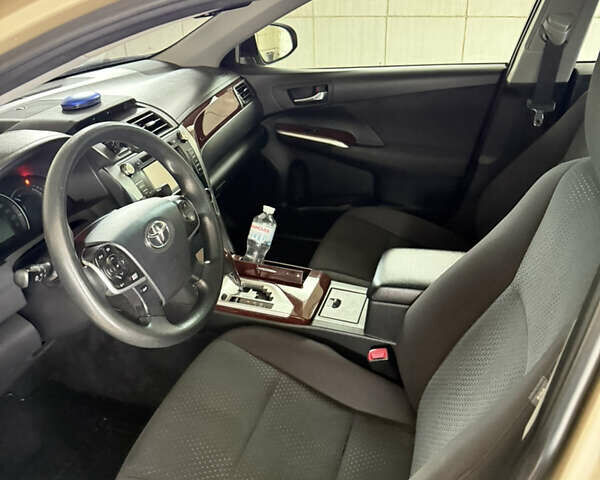 Тойота Камри 2012 в Броварах на Automoto.ua Бежевый Тойота Камри, объемом двигателя 2.49 л и пробегом 275 тыс. км за 12900 $, фото 5 на Automoto.ua