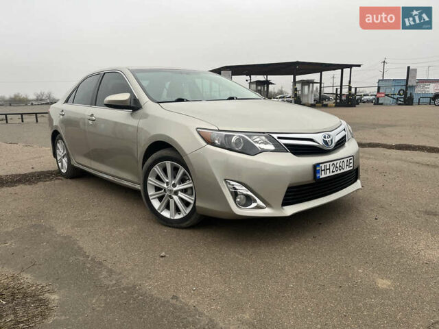 Бежевий Тойота Камрі, об'ємом двигуна 2.49 л та пробігом 126 тис. км за 14300 $, фото 2 на Automoto.ua