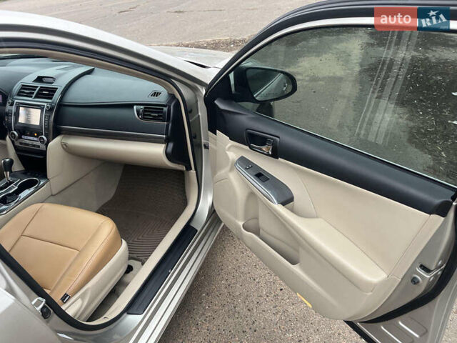 Бежевий Тойота Камрі, об'ємом двигуна 2.49 л та пробігом 126 тис. км за 14300 $, фото 14 на Automoto.ua