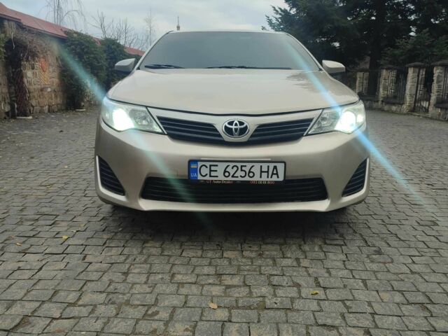 Бежевый Тойота Камри, объемом двигателя 2.5 л и пробегом 250 тыс. км за 11800 $, фото 1 на Automoto.ua