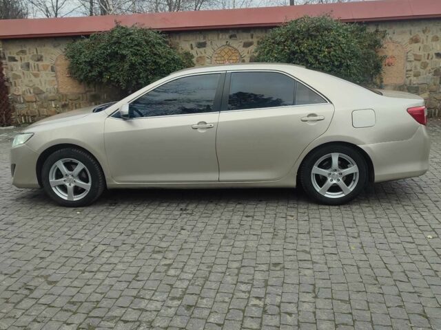 Бежевый Тойота Камри, объемом двигателя 2.5 л и пробегом 250 тыс. км за 11800 $, фото 6 на Automoto.ua