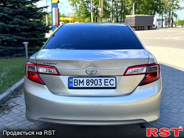 Бежевый Тойота Камри, объемом двигателя 2.5 л и пробегом 243 тыс. км за 12800 $, фото 3 на Automoto.ua